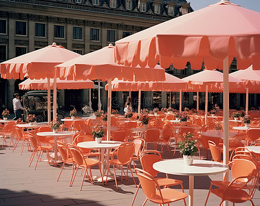 广场椅子背景图片_有橙色遮阳伞的露天咖啡馆