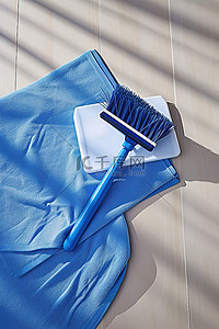蓝色卫生背景图片_用蓝色布和清洁工具清洁
