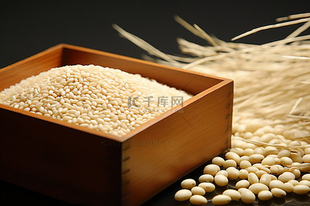 的大米背景图片_木箱里的大米和大豆
