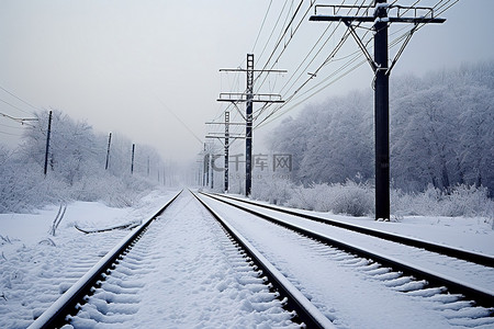 韩国雪背景图片_有电话或电线杆的雪铁轨