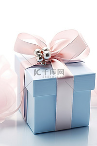 带粉色蝴蝶结的蓝色礼品盒 4738895jpg