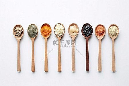 医用胶黏剂背景图片_不同的食物排列在医用勺子里