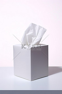 纸巾盒子样机背景图片_白色盒子上的纸巾
