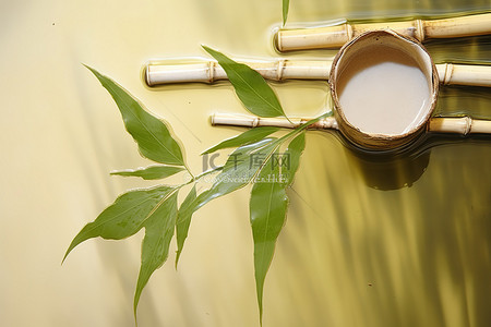 竹子传统背景图片_竹竿上挂着一片竹叶