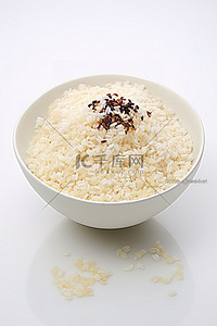一个碗背景图片_白色背景上一个未开封的碗，里面装满了米饭