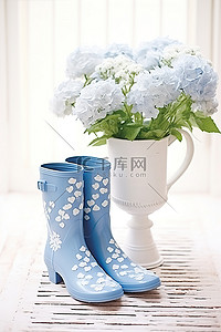 白橡背景图片_白蓝色橡胶靴和带花的软管