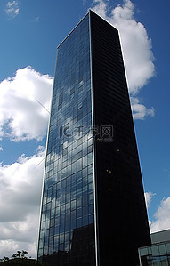 摩斯密码背景图片_一座带有高大玻璃的黑色建筑