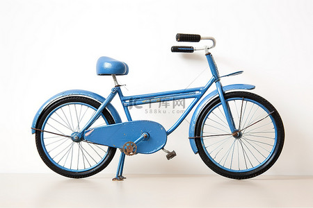 轮子主图背景图片_有轮子和把手的蓝色自行车