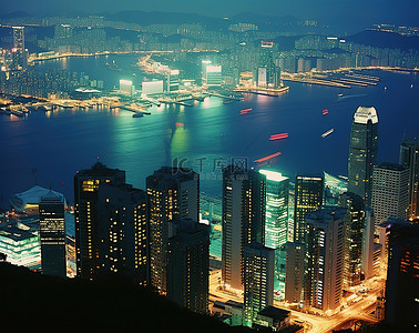 城市河流背景图片_香港城市天际线和河流的夜景