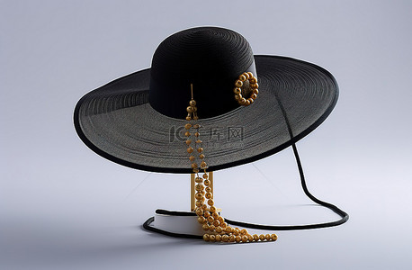 顶背景图片_一顶黑色帽子，上面附有一条雕刻项链