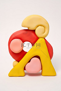 j字母logo背景图片_带有红色和棕色球的粘土片