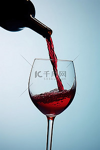红酒背景图片_将红酒倒入没有瓶子的酒杯中