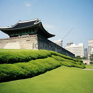 古建筑围墙背景图片_围墙和建筑物周围的绿草