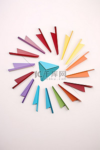 箭头背景图片_电子邮件标志形状的一圈彩虹色箭头