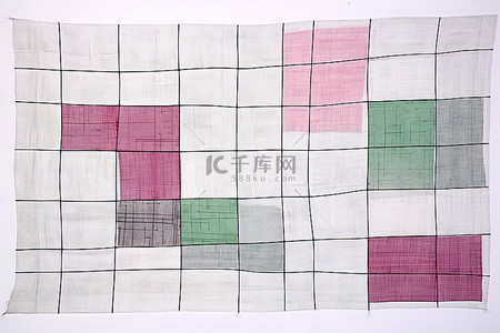 被子背景图片_由粉色和绿色布料制成的拼布被子
