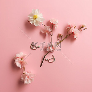 韩文背景背景图片_粉红色的纸上绣着汉字和花朵