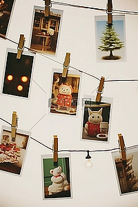 衣夹背景图片_晾衣夹上挂着五张照片卡，周围写着“圣诞节”