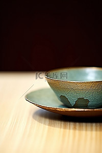 茶具茶具logo背景图片_木桌上的一个小碗