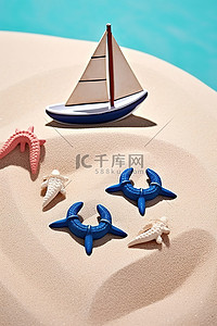 两只海星背景图片_沙滩上的两艘小船和一只海星