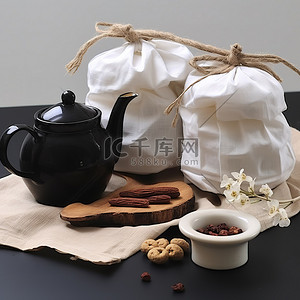 黑茶壶背景图片_茶壶黑布和一些干果