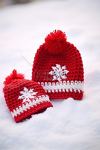 红毯背景图片_红白相间的帽子躺在雪毯上