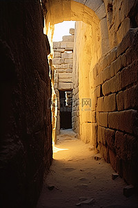 狭窄背景图片_一栋有古老石墙的老建筑内的狭窄通道
