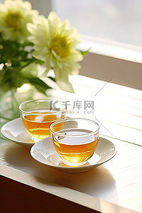 两碗茶背景图片_两碗茶坐在一朵橙花旁边