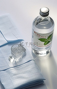 一瓶水背景图片_笔记本上放一瓶水和一条毛巾