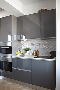 不锈钢不锈钢背景图片_配有不锈钢器具的灰白色厨房