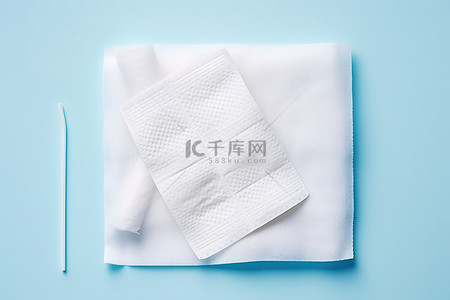 纸巾百货背景图片_塑料绷带纸巾和棉巾