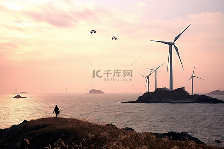 韩国欧洲蒂莫罗托岛风力涡轮机和男子降落伞
