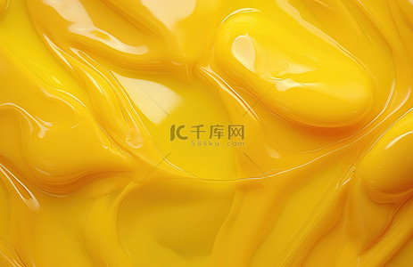 黄色冰背景图片_黄色液体纹理背景照片