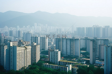 高楼大楼背景图片_一座高楼林立山峦叠翠的城市