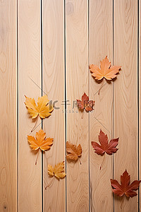 落叶银杏背景图片_木墙上的秋叶和坚果