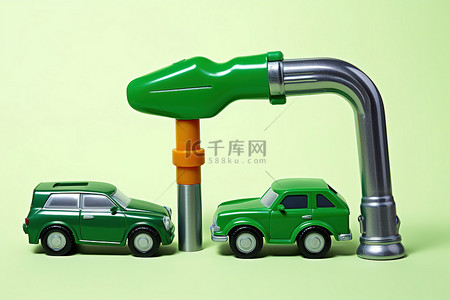 绿色的玩具背景图片_漂浮在玩具车附近的绿色气体泵