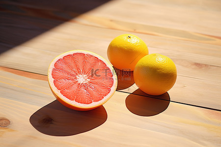 柠檬西柚背景图片_桌上的柠檬葡萄柚