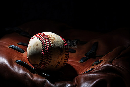 打棒球的狼背景图片_棒球手套中的棒球