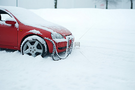 雪落背景图片_汽车冬季轮胎防滑链