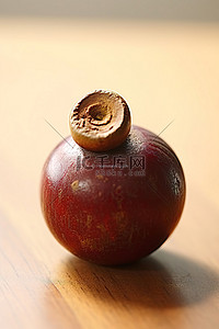 山竹台风背景图片_坐在木质表面上的小水果