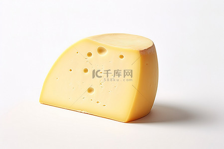 一块奶酪背景图片_白色表面上的一块奶酪
