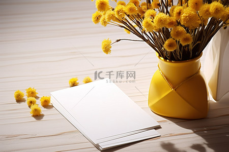 中秋的一封信背景图片_一封信和一瓶黄色的花
