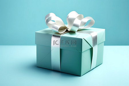 礼物礼物盒背景图片_蓝色背景上有丝带的小礼品盒