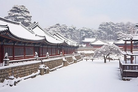 冬天古建筑背景图片_雪下的建筑物被雪覆盖