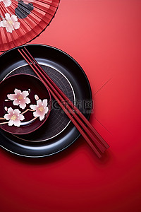 红色的筷子背景图片_红色背景中的筷子板和风扇