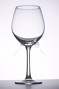 倾倒的酒杯背景图片_白色背景上显示一个透明的酒杯