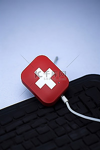 电脑鼠标背景图片_电脑鼠标上面有红十字
