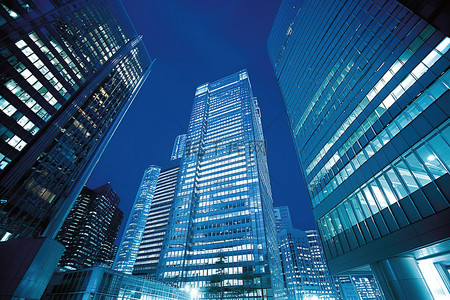 东京日本背景图片_摩天大楼在夜间被照亮的场景