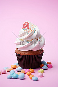 304食用钢背景图片_粉彩巧克力纸杯蛋糕和食用糖果
