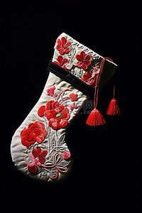 过膝长袜背景图片_黑色背景中可以看到带有蕾丝装饰的刺绣长袜