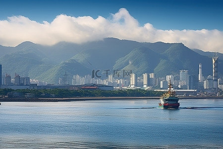 香港城市一座大城市一艘船和山脉
